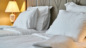 A hotel bed is seen in this undated file photo. (Pexels)