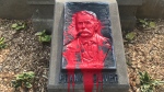 This plaque honoring Frank Oliver was vandalized in July 2021 (Darcy Seaton/CTV News)