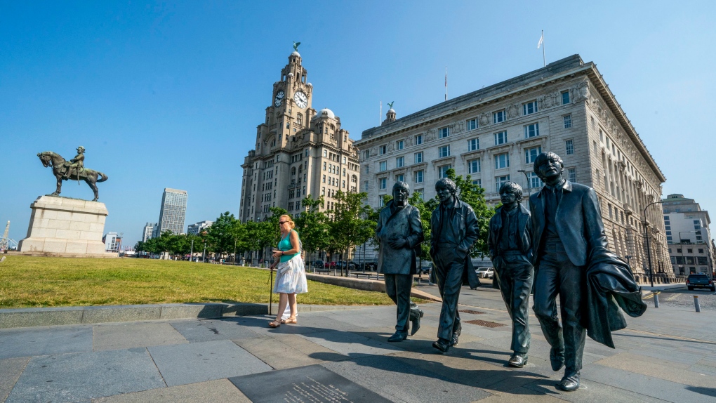 The Beatles statues and Royal Liver Building