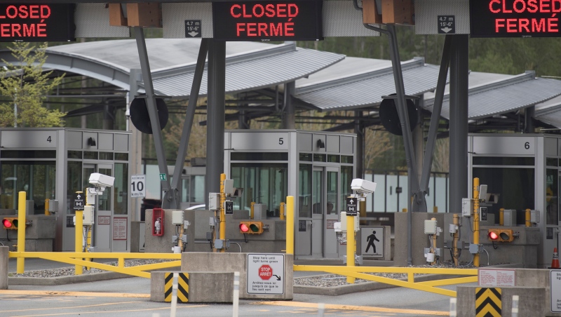 FILE - Part of Canada's land border with the United States is pictured closed at the Peace Arch border crossing in Surrey, B.C., Tuesday, April 28, 2020. THE CANADIAN PRESS/Jonathan Hayward 