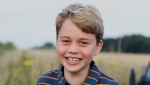 Prince William and his wife Kate released a new photograph of their son Prince George with a beaming smile to mark his eighth birthday on Thursday. (The Duke and Duchess of Cambridge/Twitter) 