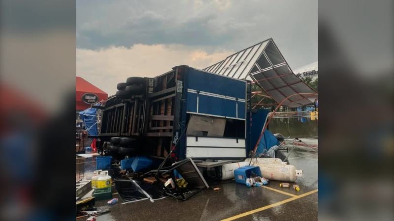 A Queen City Ribfest trailer is seen flipped on its side following a significant storm on July 22, 2021. (Source: Queen City Ribfest/Facebook)