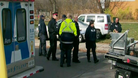 Police prepare to begin the cleanup of a suspected meth lab found on Toronto's Woburn Avenue, Thursday, Nov. 18, 2009.