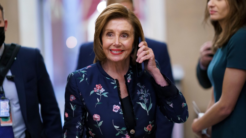 Speaker of the House Nancy Pelosi, D-Calif., returns to her office where members of the House select committee on the January 6th attack on the Capitol are preparing for the start of hearings next week, at the Capitol in Washington, Thursday, July 22, 2021. (AP Photo/J. Scott Applewhite) 
