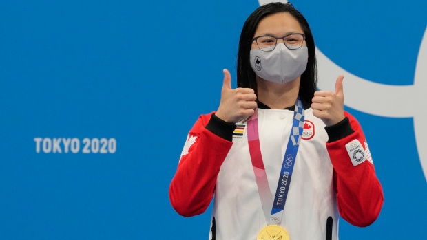 Mac Neil wins Canada’s first gold in Tokyo Games first in women’s 100 butterfly