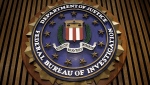 FBI used 'provocative photos' of female office staff to catch sexual predators, a watchdog said in a report issued on August 2. (Chip Somodevilla/Getty Images/CNN) 