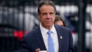 Former New York Gov. Andrew Cuomo prepares to board a helicopter after announcing his resignation, Tuesday, Aug. 10, 2021, in New York. (AP Photo/Seth Wenig)