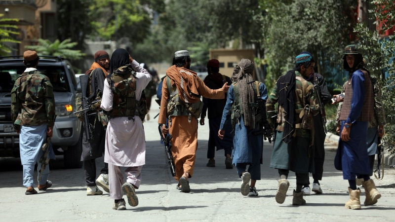 Taliban fighters patrol in the Wazir Akbar Khan neighborhood in the city of Kabul, Afghanistan, Wednesday, Aug. 18, 2021. (AP Photo/Rahmat Gul) 