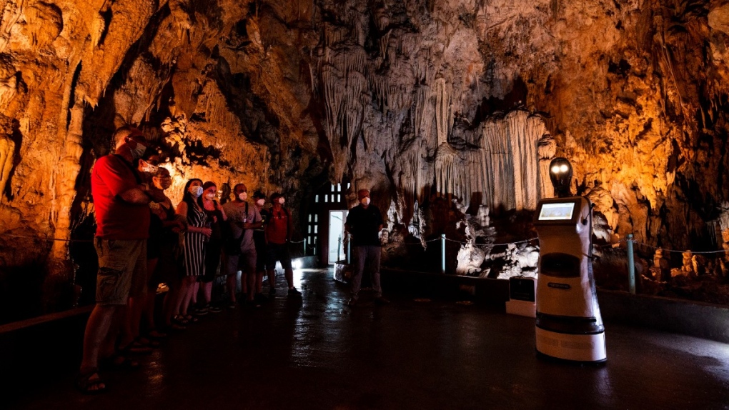 Persephone guides visitors inside Alistrati cave