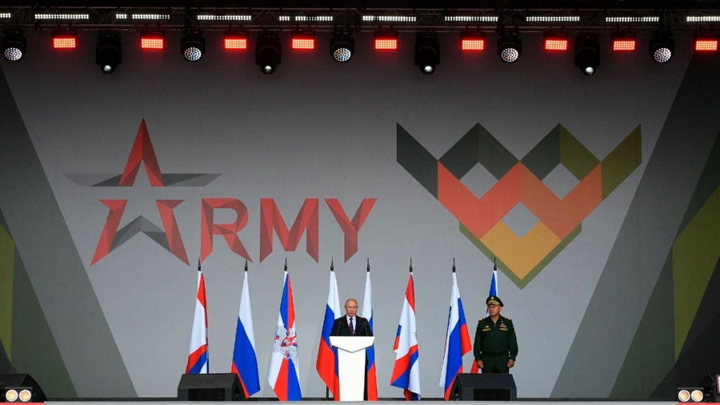 Putin, centre, speaks in Alabino, Russia