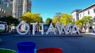 The Ottawa sign on York Street in Ottawa's ByWard Market. (Photo by Jacob Meissner on Unsplash)