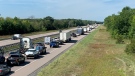 Significant traffic delays on Highway 401 westbound just west of Kingston, Ont. following a fatal crash Monday, Aug. 29, 2021. (Kimberley Johnson / CTV News Ottawa)