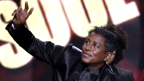 Jermaine Jackson accepts the award for best soul R&B favorite male artist on behalf of his late brother Michael Jackson at the 37th Annual American Music Awards on Sunday, Nov. 22, 2009, in Los Angeles. (AP Photo/Matt Sayles)