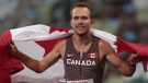 Canada's Nate Riech celebrates after winning the men's T38 1500-meters final at Tokyo 2020 Paralympic Games, Saturday, Sept. 4, 2021, in Tokyo, Japan. (AP Photo/Emilio Morenatti)