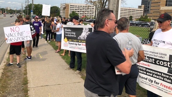 Protesters gather outside the London Health Science Centre in London, Ont. on Monday, Sept. 13, 2021. (Nick Paparella / CTV News)