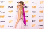 Lily-Rose Depp walks the red carpet as she promotes the film "Wolf" during the Toronto International Film Festival, on Friday, September 17, 2021. THE CANADIAN PRESS/Chris Young