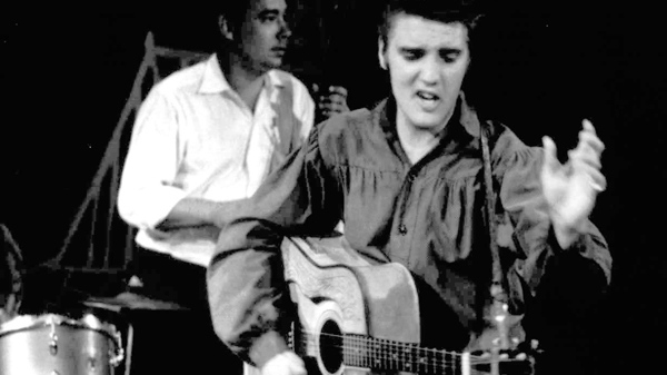 In this Sept. 9, 1956 file photo originally released by the Museum of Television & Radio, Elvis Presley performs on the 'Ed Sullivan Show,' in New York. (AP / Museum of Television & Radio)