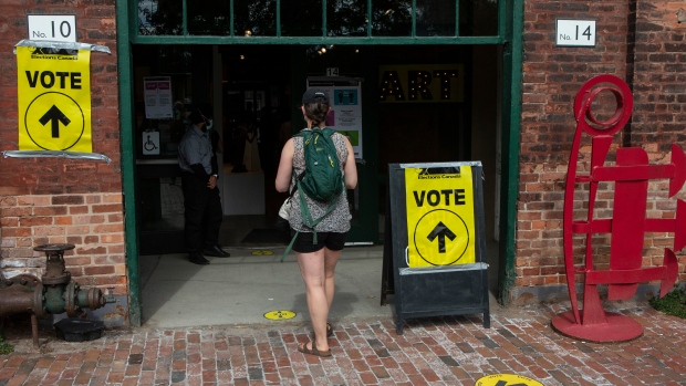 A voter enters a poling station to cast their ballot in Toronto's Spadina-Fort York district on Monday September 20 , 2021. THE CANADIAN PRESS/Chris Young 
