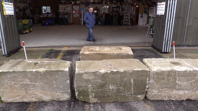 Concrete blocks placed in front of Phil Englishman's hangar at the Saugeen Municipal Airport, Sept. 22, 2021. (Scott Miller / CTV News)