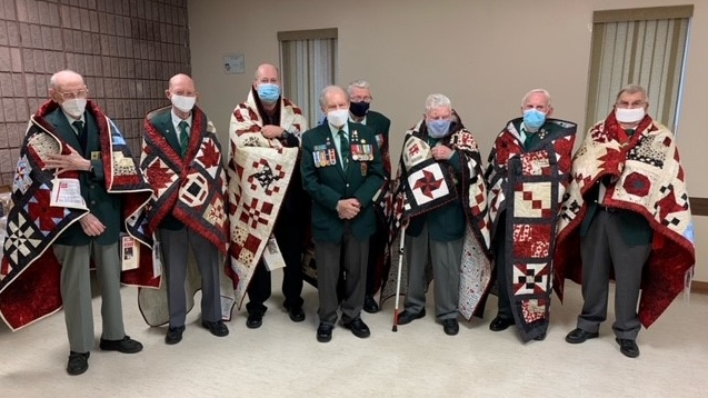 Eight members of the Korean Veterans Association were presented with with quilts from Quilts of Valour in Kingston, Ont. (Kimberley Johnson/CTV News Ottawa