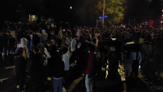 Hundreds of people take over a Sandy Hill street to celebrate following the Panda Game in Ottawa. (Aaron Reid/CTV News Ottawa)