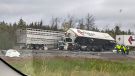 Several tractor trailers collided in the westbound lanes of Highway 401 near Gardiners Road in Kingston, Ont. Oct. 13, 2021. Two drivers were killed. (Submitted)
