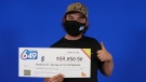 Maverick Bertrand, of Pembroke, Ont. collected the winnings from the Lotto 6/49 ticket he bought with his mother in Pembroke, Ont. (Ontario Lottery and Gaming Corporation photo)