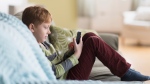 Nearly one-third of parents of children ages 7 to 9 reported their kids used social media apps in the first six months of 2021. (Tetra Images/Getty Images)