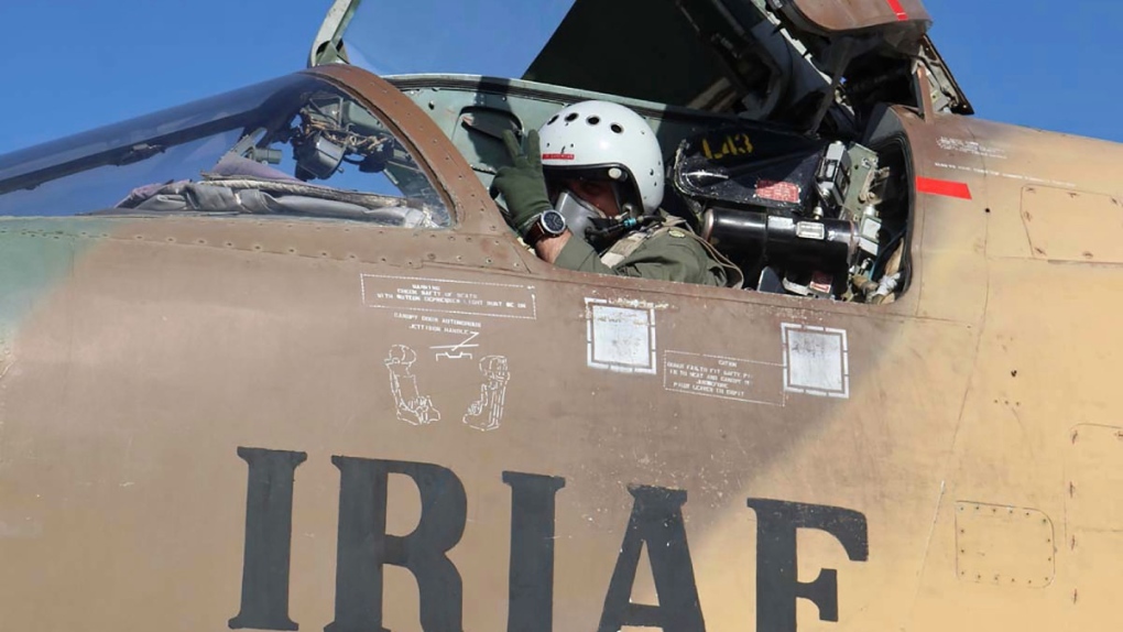 Iranian Air Force pilot gestures