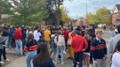 People gather in the University District in Kingston, Ont. Oct. 23, 2021. Kingston police declared aggravated nuisance parties Saturday afternoon. (Kimberley Johnson/CTV News Ottawa)