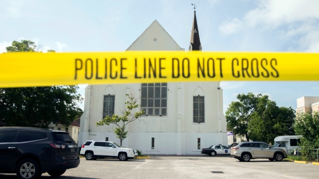 Families of 9 killed in South Carolina church settle with feds over gun