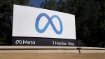 Facebook unveiled their new Meta sign at the company headquarters in Menlo Park, Calif., Thursday, Oct. 28, 2021. (AP Photo/Tony Avelar) 