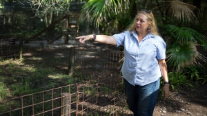 Carole Baskin, founder of Big Cat Rescue, walks the property near Tampa, Fla. on July 20, 2017. (Loren Elliott/Tampa Bay Times via AP, File)
