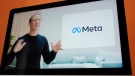 FILE - Seen on the screen of a device in Sausalito, Calif., Facebook CEO Mark Zuckerberg announces the company's new name, Meta, during a virtual event on Thursday, Oct. 28, 2021. . (AP Photo/Eric Risberg, File)