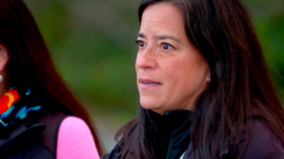 Jody Wilson-Raybould sits with her sister
