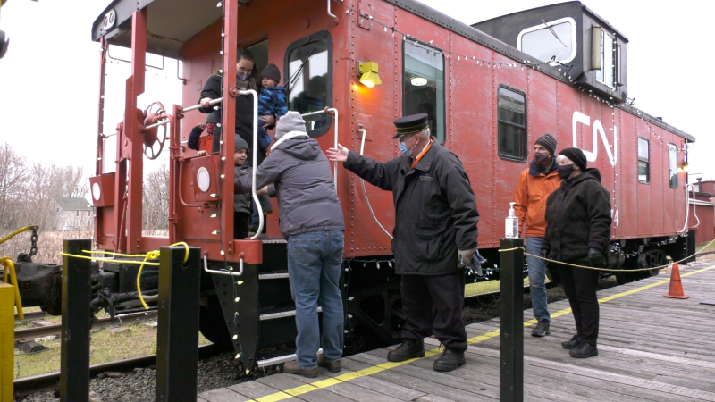 Families board the North Pole Express at the Railway Museum of Eastern Ontario in Smiths Falls, Ont. (Nate Vandermeer/CTV News Ottawa)