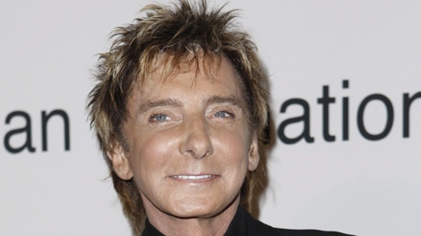 Barry Manilow arrives at the Clive Davis pre-Grammy party in Beverly Hills, Calif. on Saturday, Feb. 7, 2009. (AP Photo/Matt Sayles)