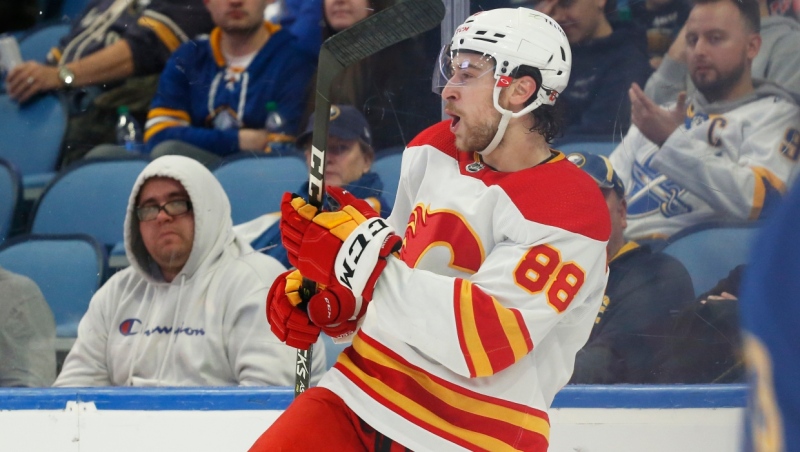 Calgary Flames left wing Andrew Mangiapane (88) celebrates after his goal during the second period of an NHL hockey game against the Buffalo Sabres, Thursday, Nov. 18, 2021, in Buffalo, N.Y. (AP Photo/Jeffrey T. Barnes) 