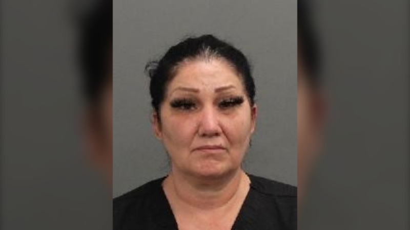 Brigitte Cleroux, 49, is seen in an image provided by the Ottawa Police Service. She is accused of impersonating a nurse in multiple Canadian cities. 