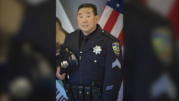 This undated photo provided by the Town of Colma Police Department shows former Officer Kevin Nishita, who worked as an armed guard providing security for many journalists in the region. (Brandon Vaccaro/Colma Police Department via AP)