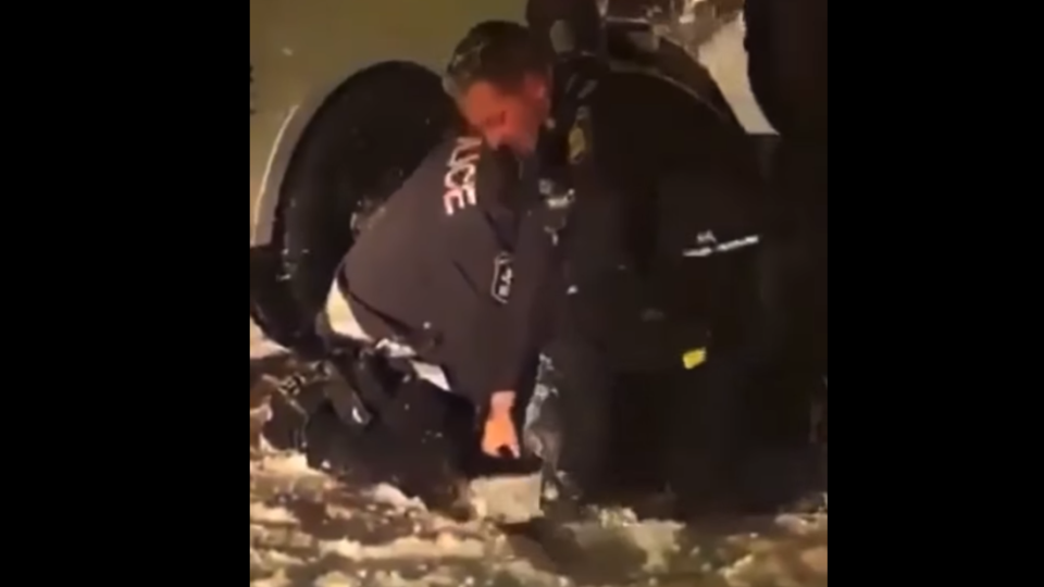 Quebec City police officer kicks snow in face