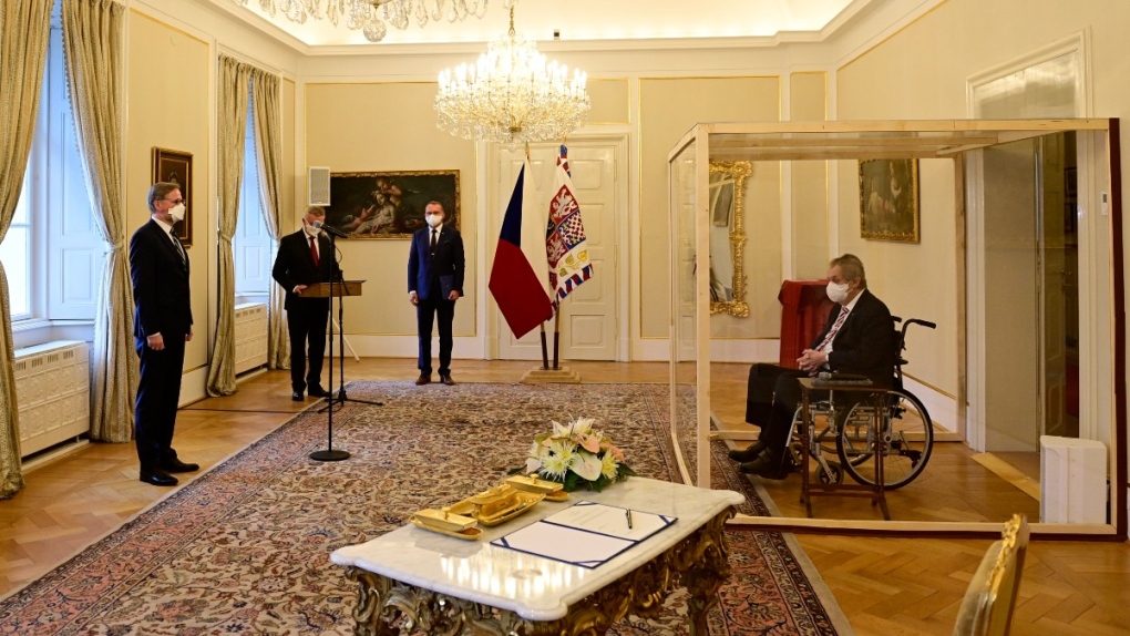 Czech President Milos Zeman, right, in a box