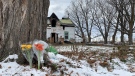 Neighbours left tributes at the scene of a fatal fire in Westport, Ont. Wednesday, Dec. 1, 2021. (Kimberley Johnson/CTV News Ottawa)