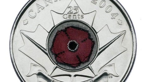 This 2004 file photo provided by the Royal Canadian Mint, shows a 2004 silver-colored 25-cent piece, known as the poppy quarter. (AP Photo/Royal Canadian Mint)