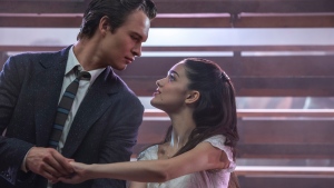This image released by 20th Century Studios shows Ansel Elgort as Tony, left, and Rachel Zegler as Maria in "West Side Story." (Niko Tavernise/20th Century Studios via AP) 