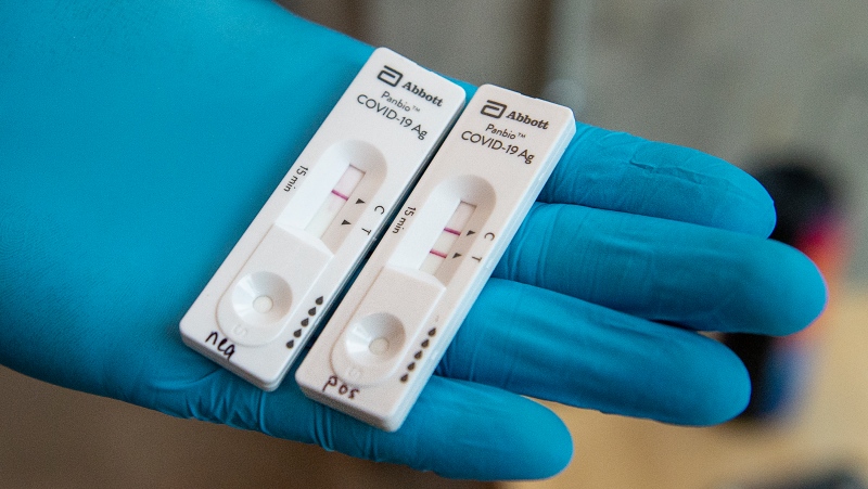 FILE - An Abbott Laboratories Panbio COVID- 19 Rapid Test device is displayed at a pop-up COVID-19 testing site on the Dalhousie University campus in Halifax on Wednesday, Nov. 23 2021. THE CANADIAN PRESS/Andrew Vaughan 