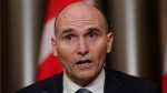 Minister of Health Jean-Yves Duclos announces a government advisory against non-essential international travel due to the Omicron COVID-19 variant at a press conference in Ottawa on Wednesday, December 15, 2021. THE CANADIAN PRESS/Patrick Doyle