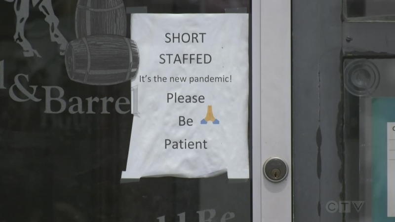 Businesses post signs on entryways during the pandemic. (Katelyn Wilson/CTV News)