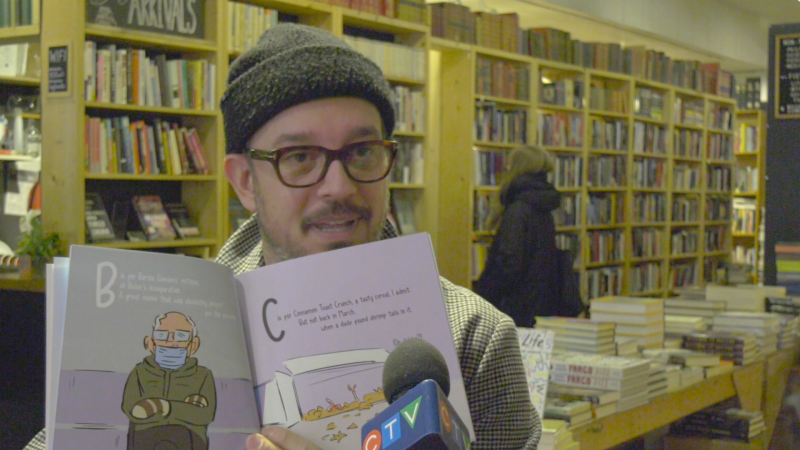 Ottawa author Jon Sinden shows off his book, 'The Hot Mess that was 2021'. (Jackie Perez/CTV News Ottawa)