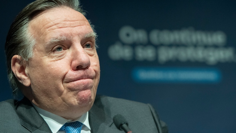 Quebec Premier Francois Legault speaks during a news conference in Montreal, Thursday, December 30, 2021, where he gave an update on the ongoing COVID-19 pandemic in the province. THE CANADIAN PRESS/Graham Hughes 
